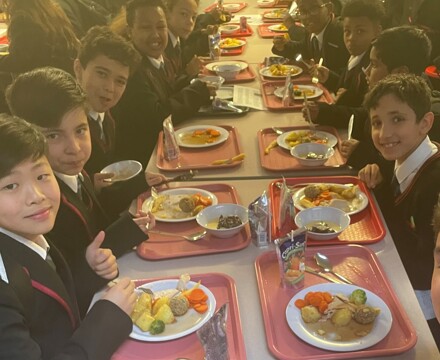 Students eating xmas lunch in canteen